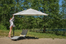 woman_spreading_a_havana_umbrella_over_a_star_lounger_6d65.product_gallery.jpg